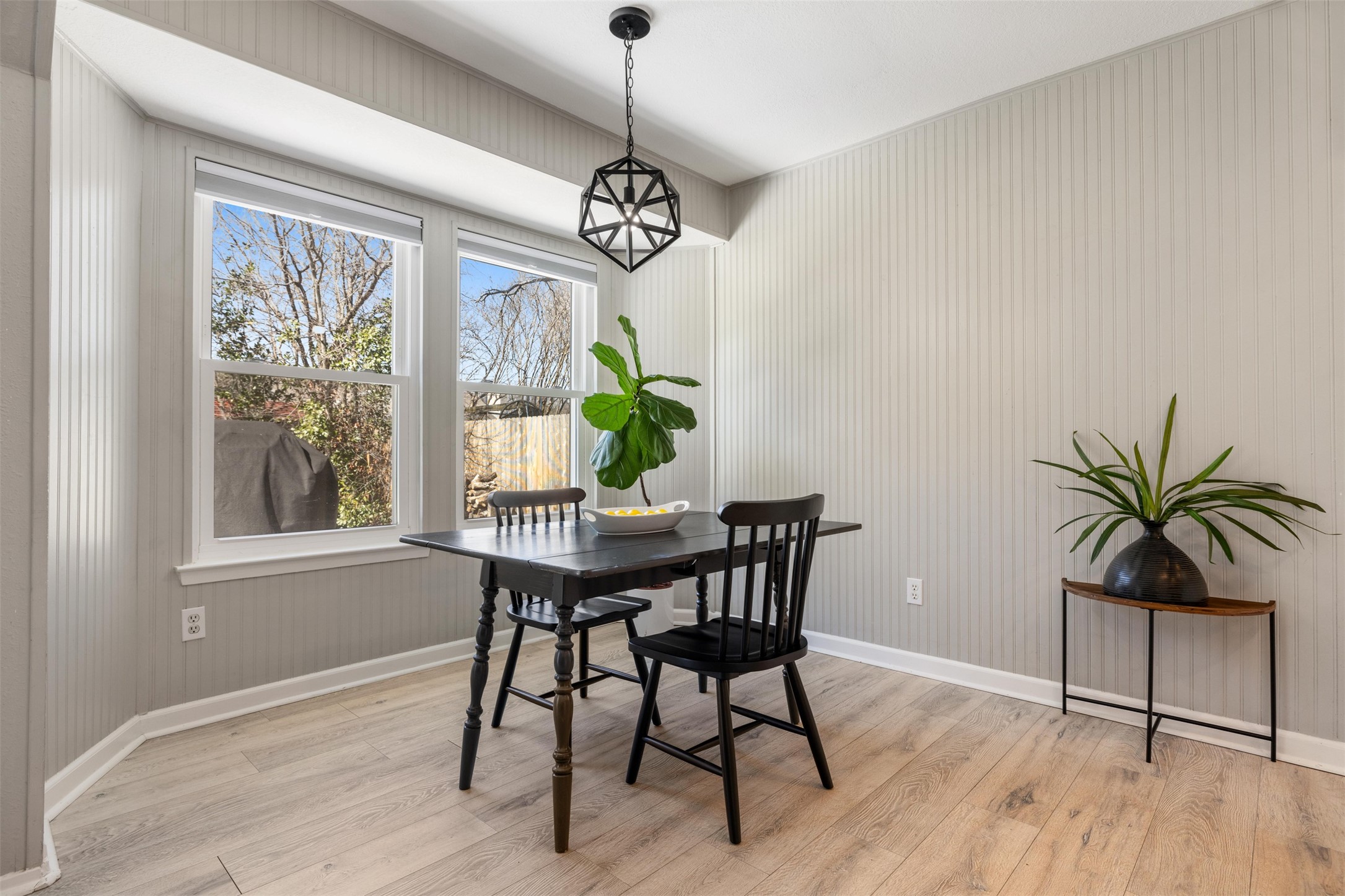11302 Windermere Meadows Austin, TX 78759 - Photo 6 of 26 a view of a dining room with furniture window and wooden floor