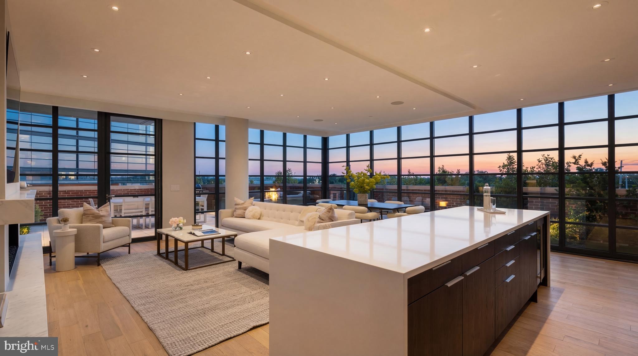 a large white kitchen with a large window