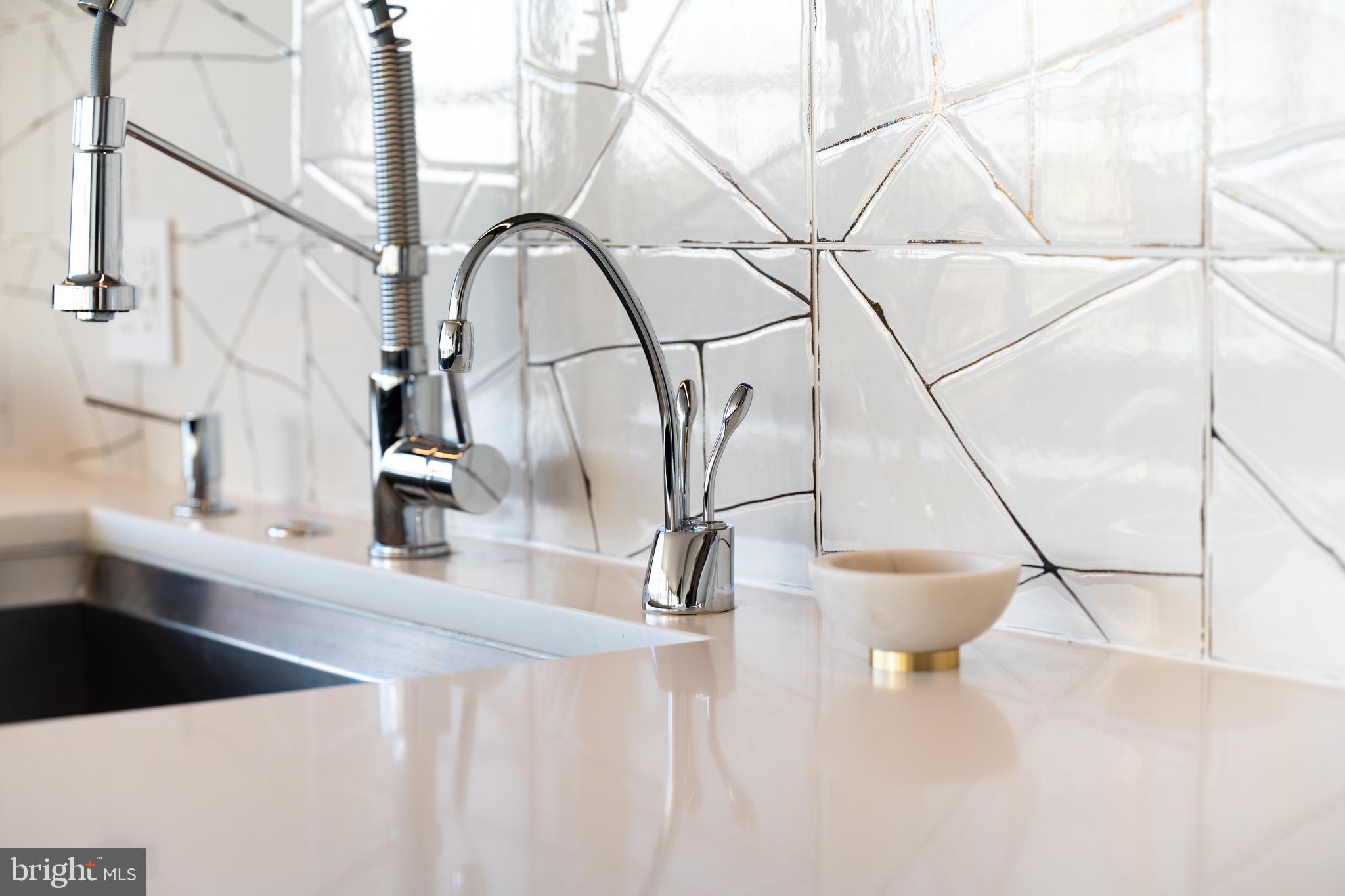 45 Sutton Square Southwest, Unit 306 Washington, DC 20024 - Photo 12 of 50 Custom Backsplash + Instant Hot & Cold Water