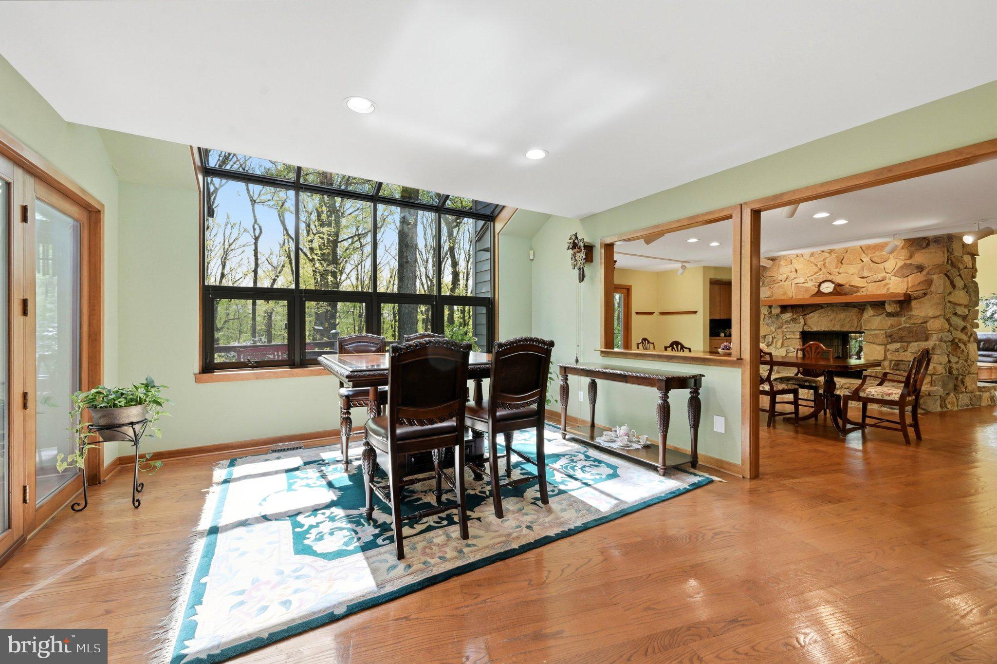 1168 Skelp Level Road Downingtown, PA 19335 - Photo 13 of 80 Sunlit dining space with nature views.