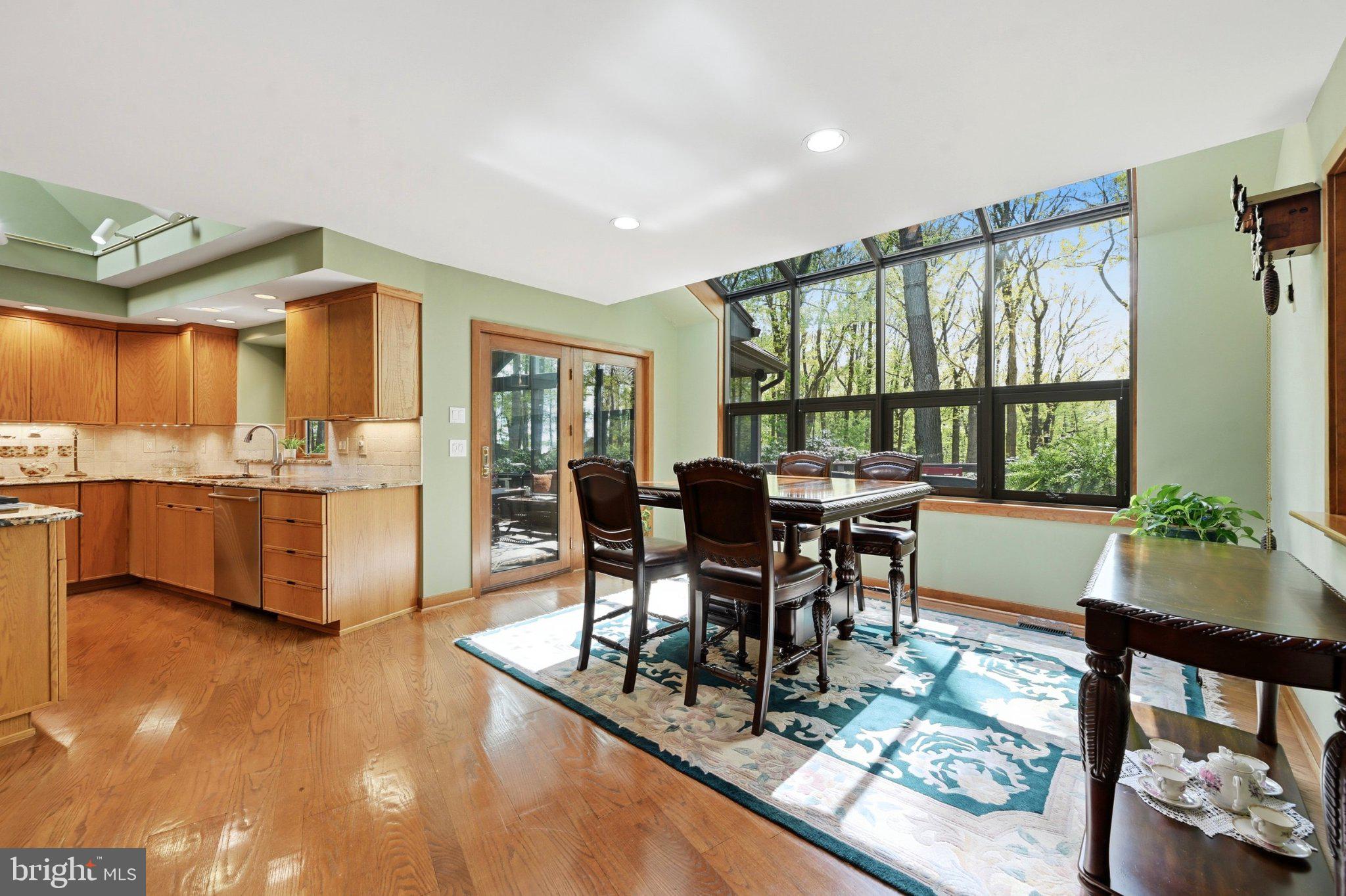 1168 Skelp Level Road Downingtown, PA 19335 - Photo 14 of 80 Sunlit dining space with nature views.