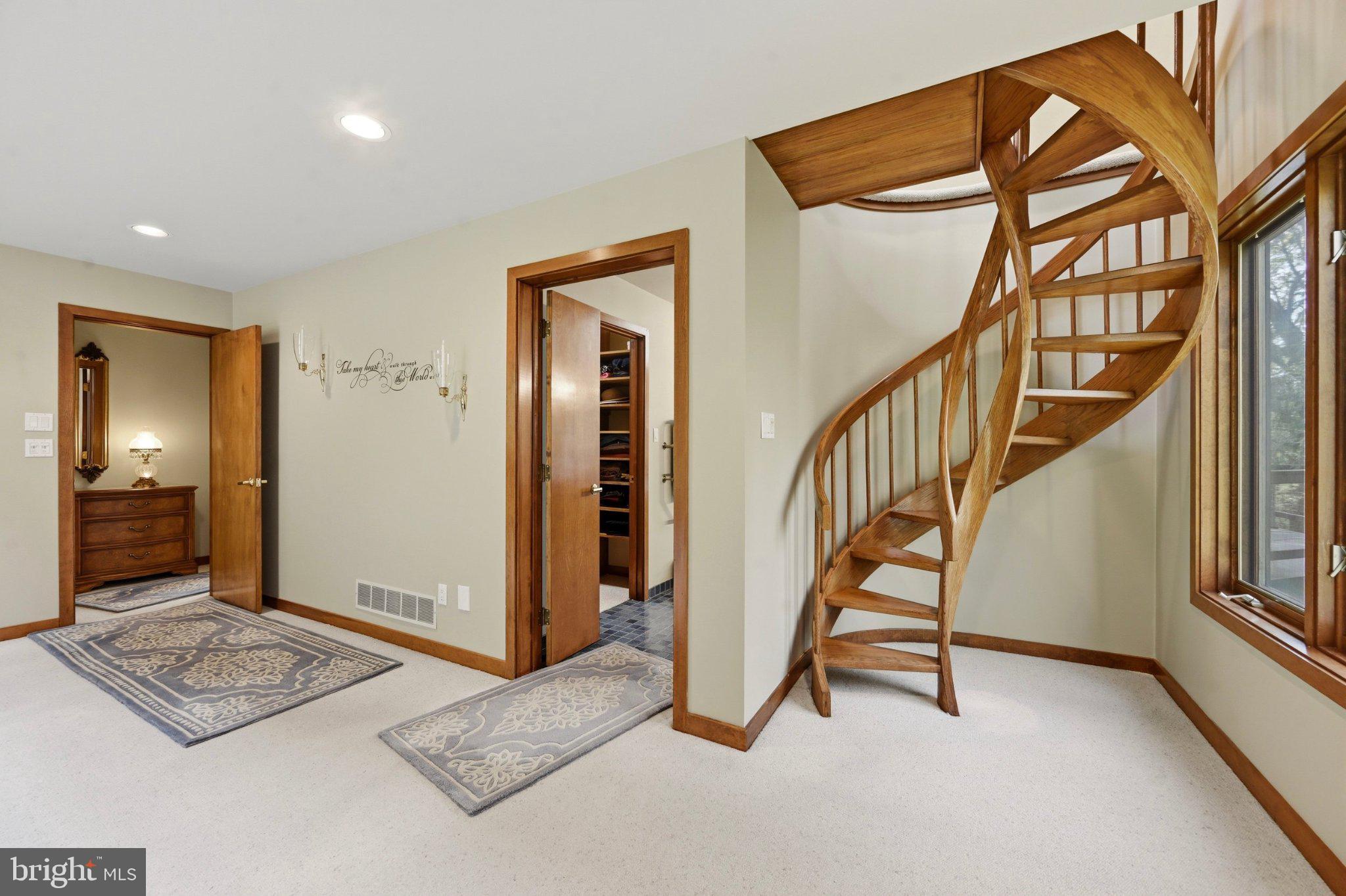 1168 Skelp Level Road Downingtown, PA 19335 - Photo 26 of 80 Elegant spiral staircase invites exploration.