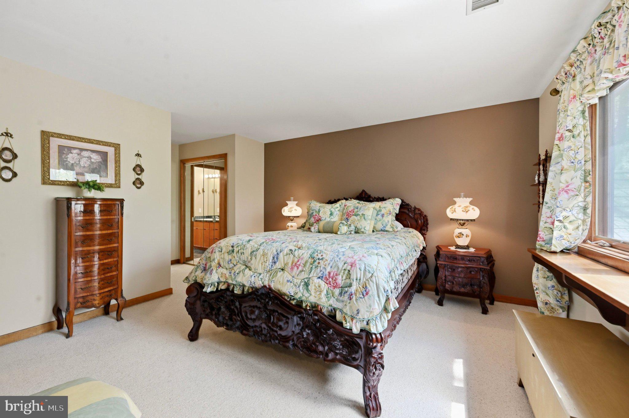 1168 Skelp Level Road Downingtown, PA 19335 - Photo 43 of 80 Charming bedroom with floral accents.