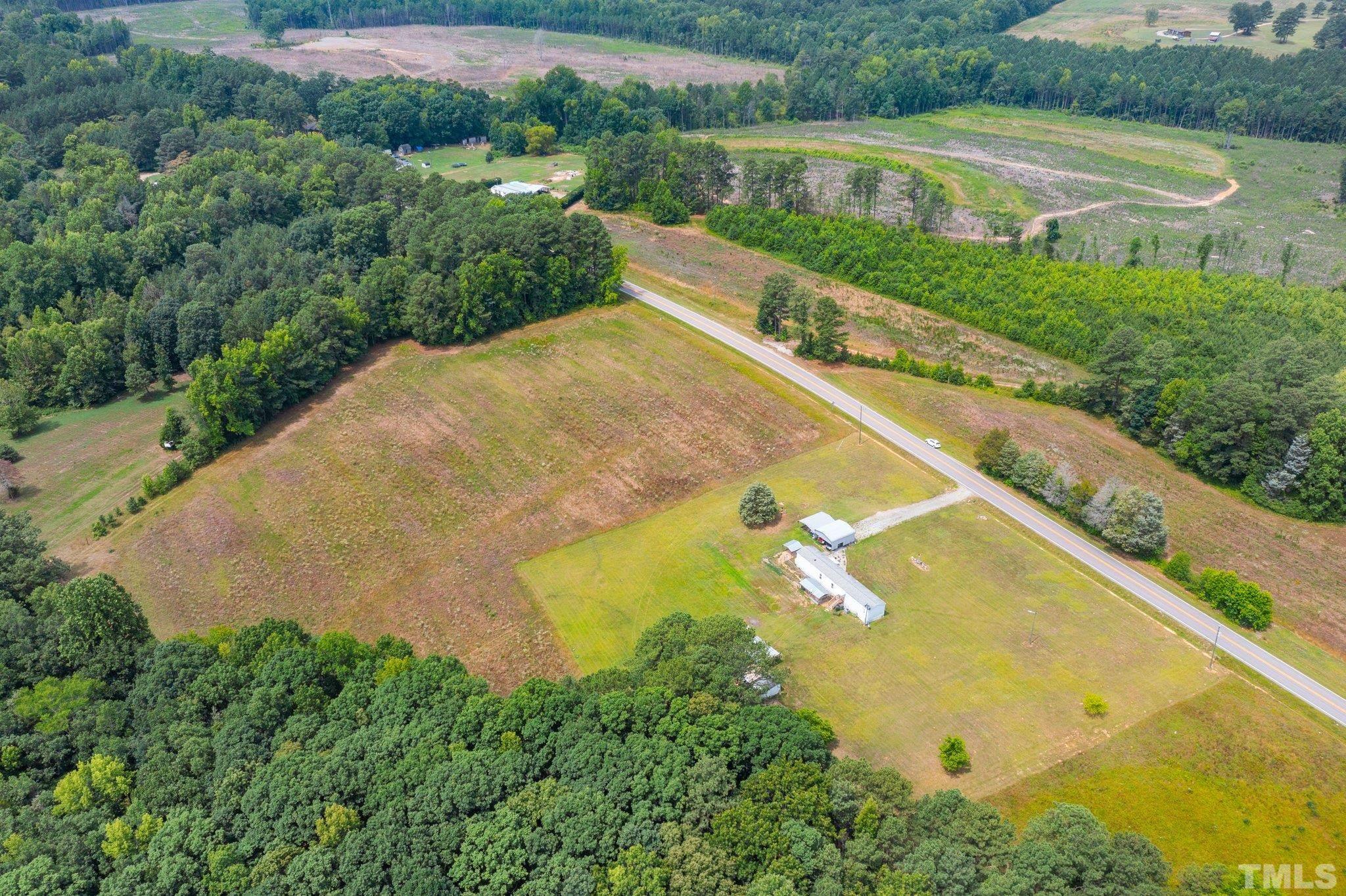 672 Green Hill Road Franklinton, NC 27525 - Photo 12 of 16 an aerial view of residential house with outdoor space and a lake view