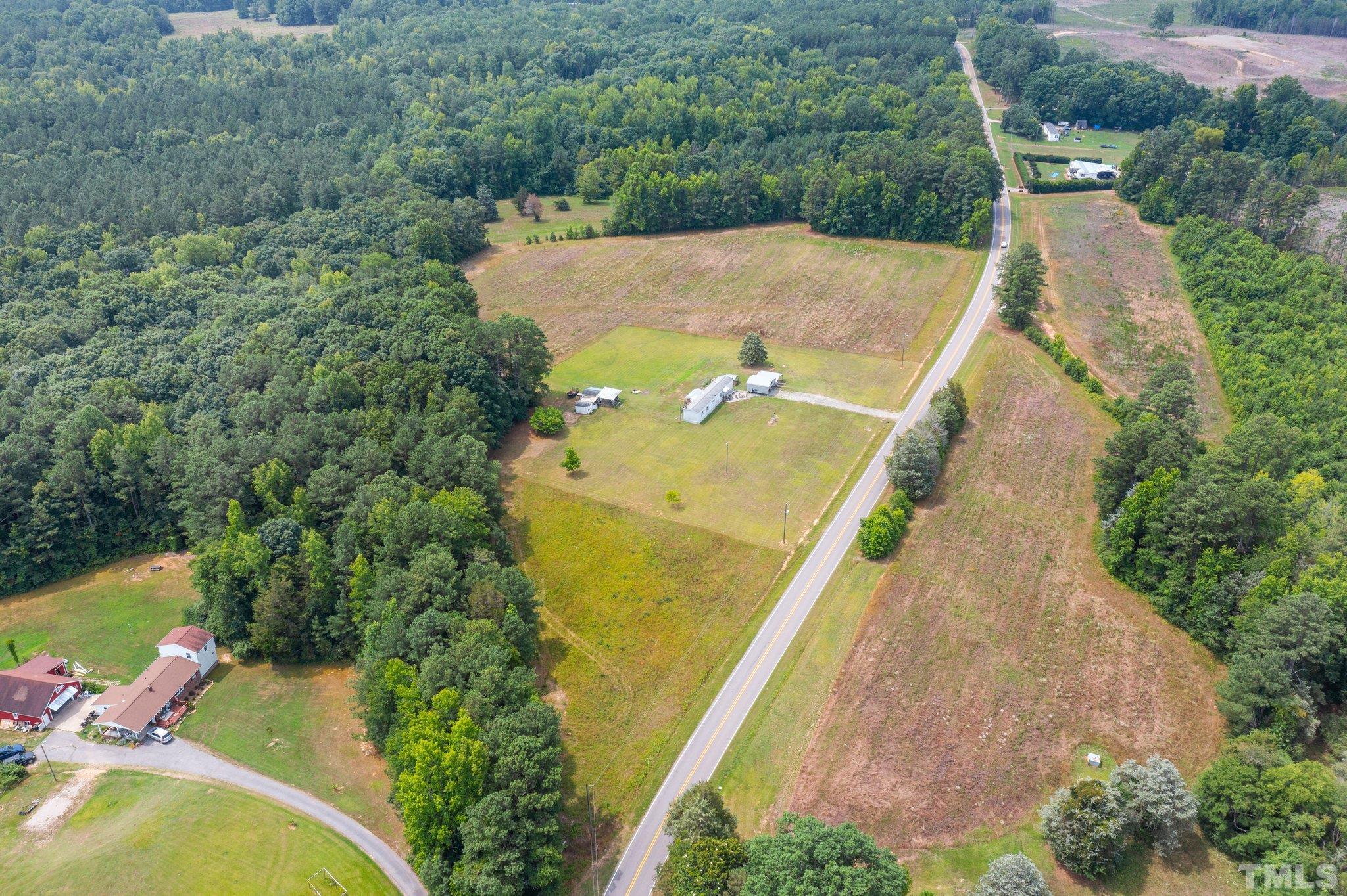 672 Green Hill Road Franklinton, NC 27525 - Photo 14 of 16 an aerial view of a house with outdoor space