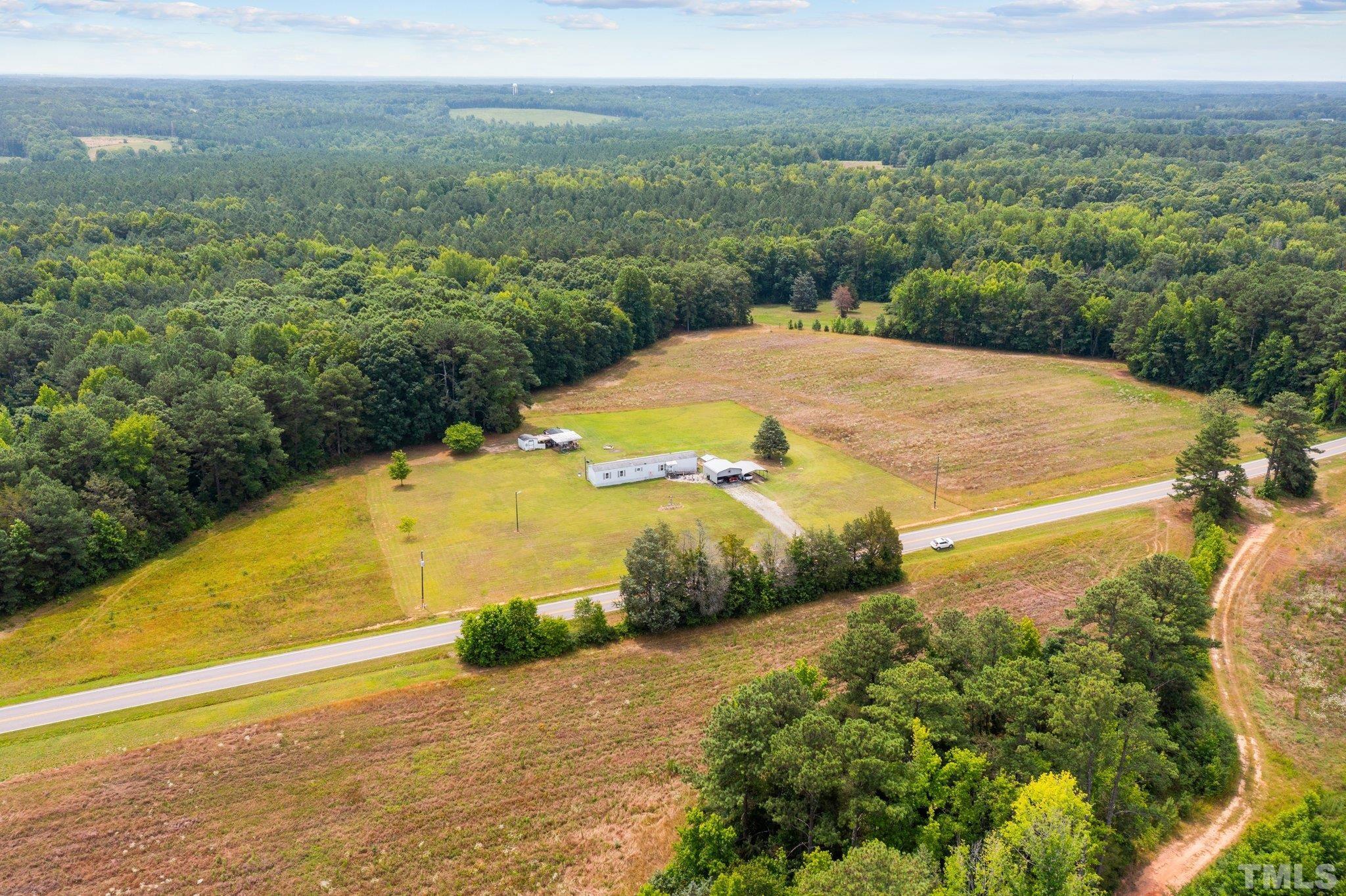 672 Green Hill Road Franklinton, NC 27525 - Photo 16 of 16 a view of an ocean and a mountain view
