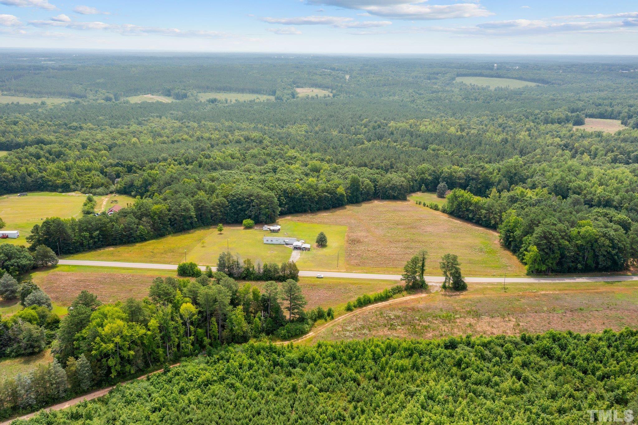 672 Green Hill Road Franklinton, NC 27525 - Photo 4 of 16 a view of a lake with an ocean