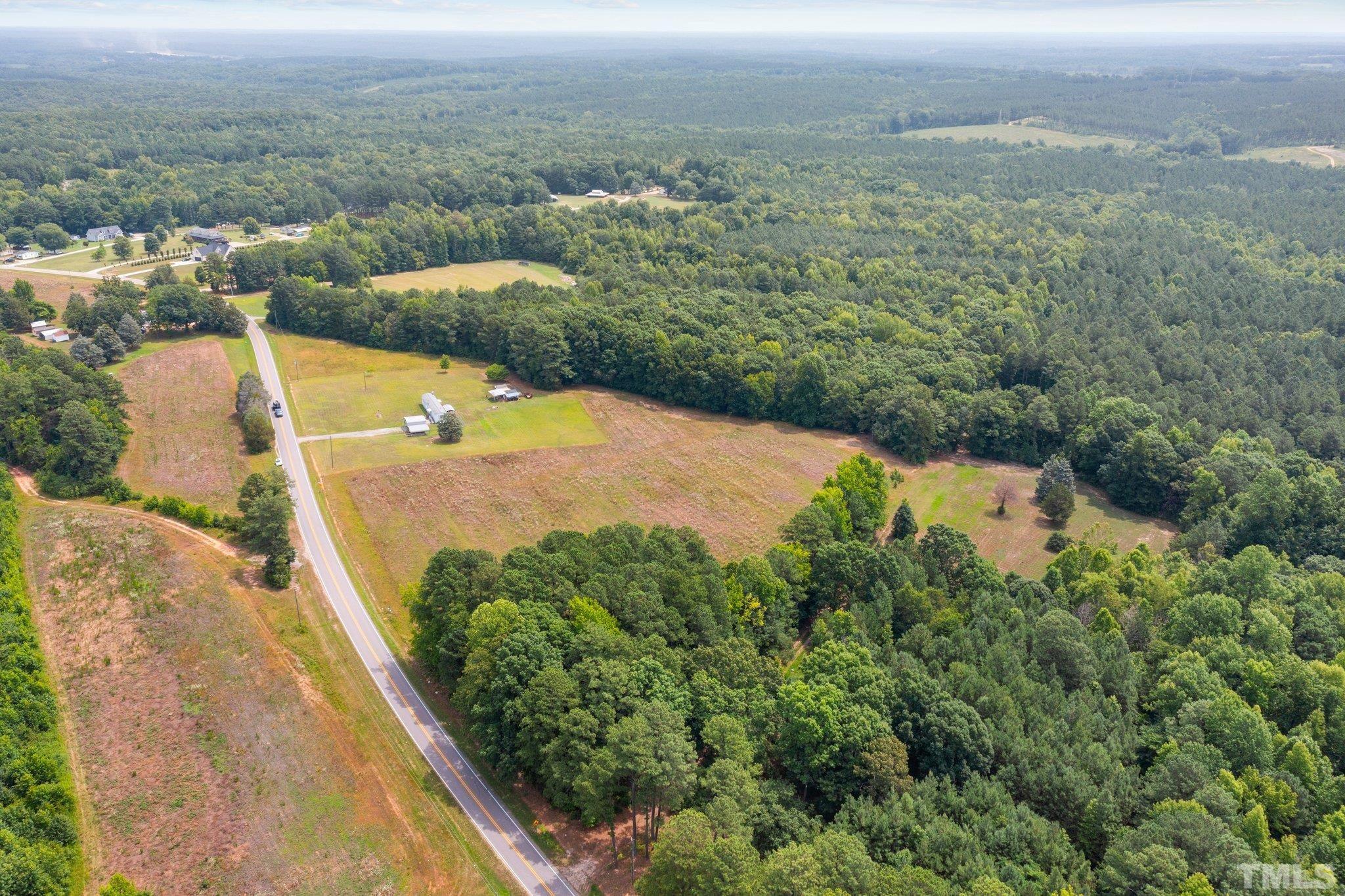 672 Green Hill Road Franklinton, NC 27525 - Photo 6 of 16 an aerial view of residential houses with outdoor space and trees