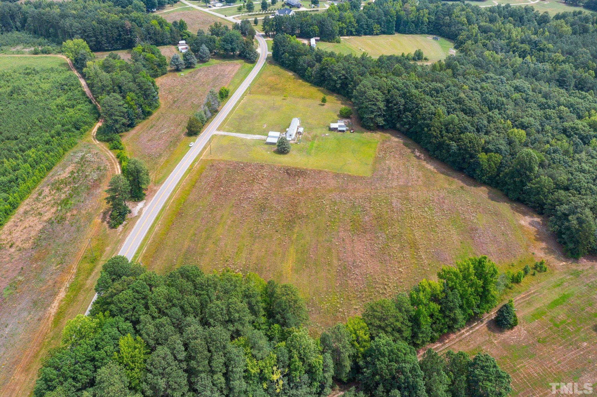 672 Green Hill Road Franklinton, NC 27525 - Photo 7 of 16 an aerial view of a residential houses with outdoor space and swimming pool