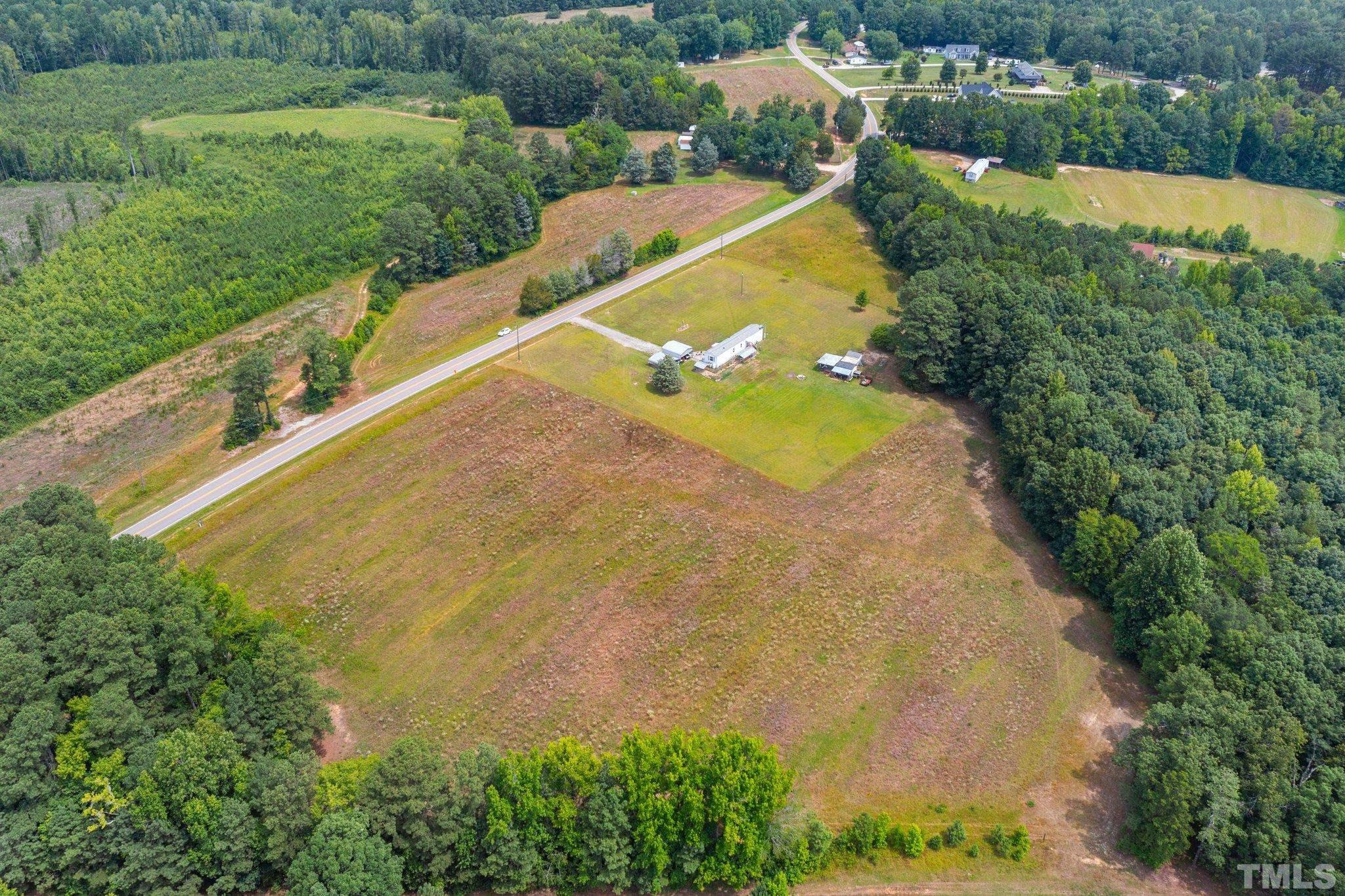 672 Green Hill Road Franklinton, NC 27525 - Photo 8 of 16 a view of a swimming pool and mountain view