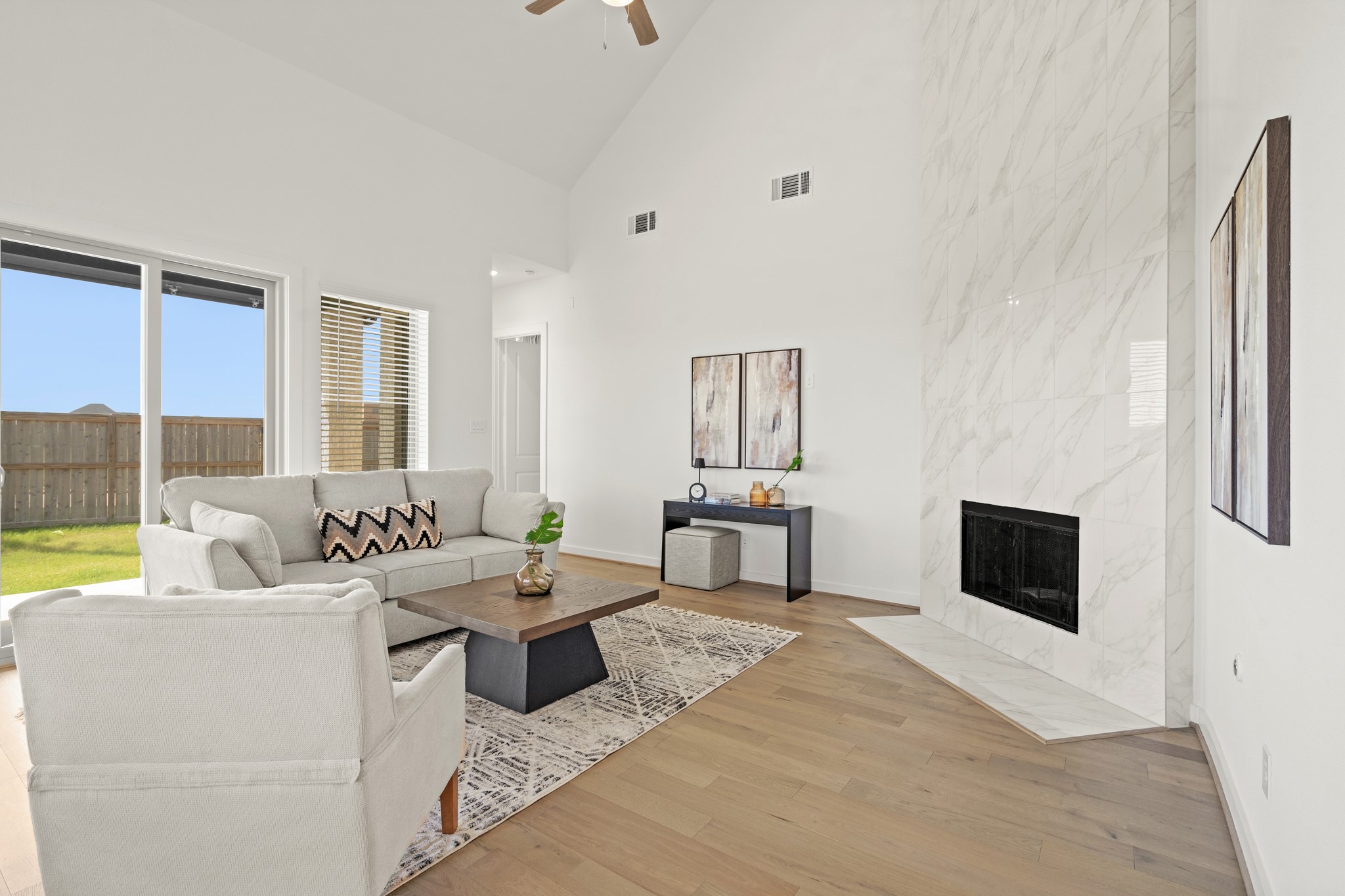 7303 Compass Drive Katy, TX 77493 - Photo 13 of 31 a living room with furniture and a flat screen tv