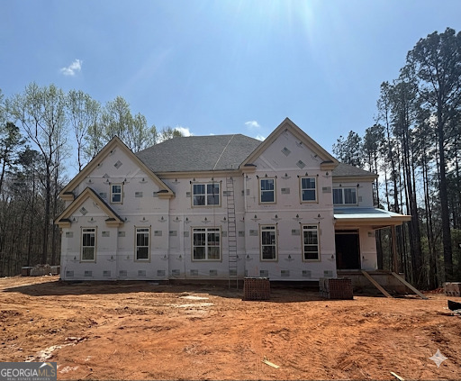 2037 Boulder Ridge Lane Bishop, GA 30621 - Photo 3 of 10 a front view of a house with a yard