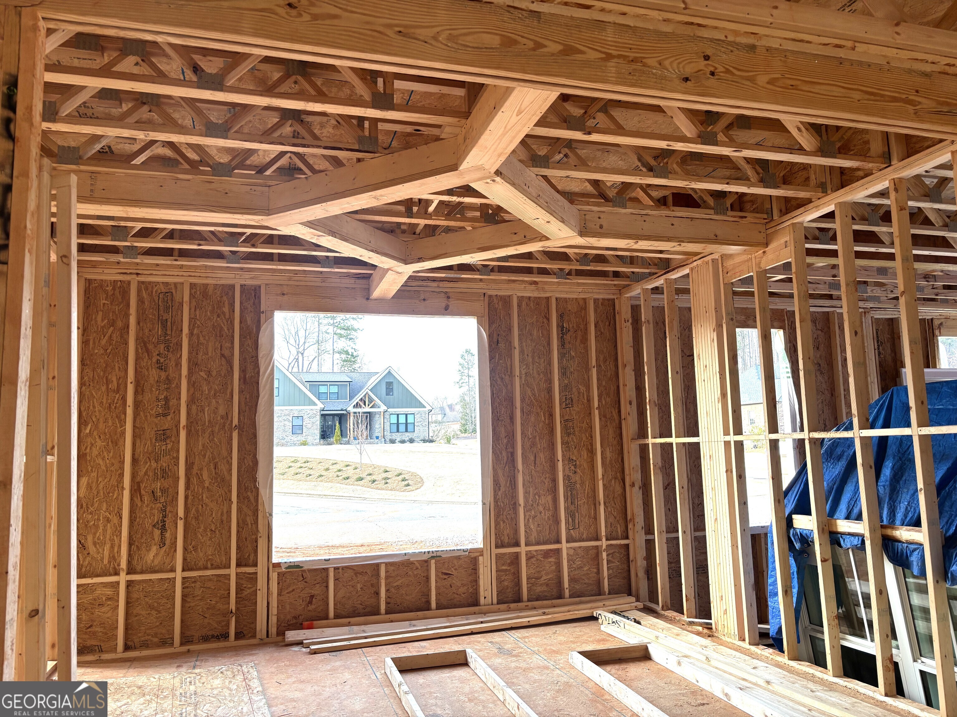 2037 Boulder Ridge Lane Bishop, GA 30621 - Photo 5 of 10 a view of an empty room with a window