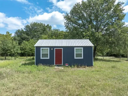 a view of backyard of house
