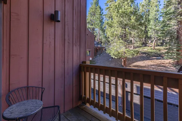 a view of a porch with a chair