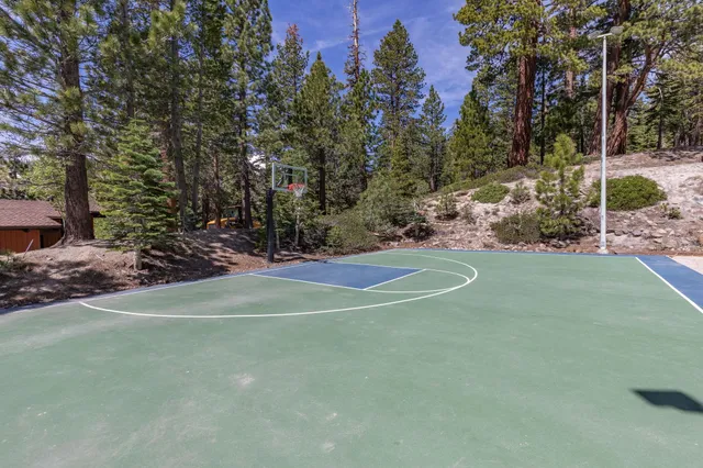 a view of a chairs and table in a patio