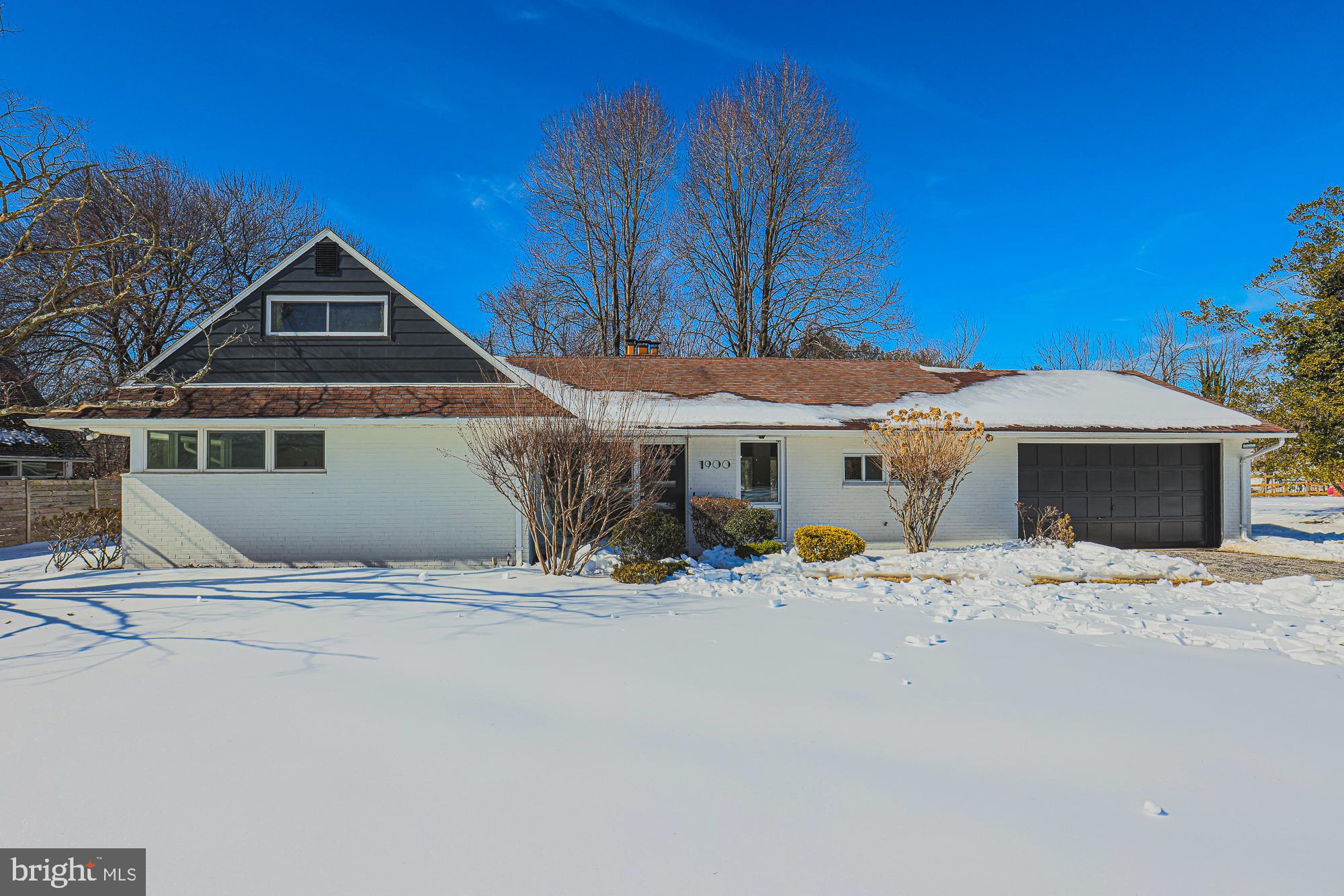 7900 Ivy Lane Baltimore, MD 21208 - Photo 2 of 34 a front view of a house with a yard