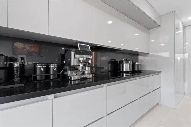 a bathroom with a toilet sink and shower