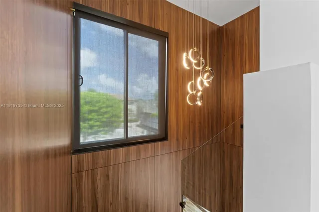 a bathroom with a shower a toilet and sink