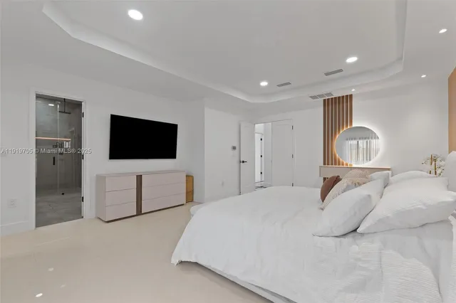 a view of workspace with wooden floor windows