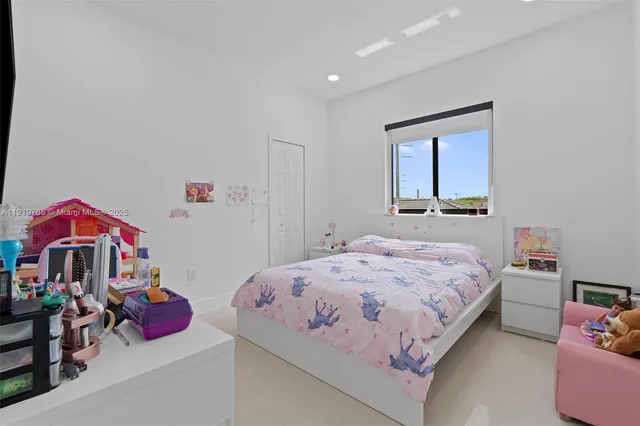 a view of an outdoor sitting area with furniture and backyard view