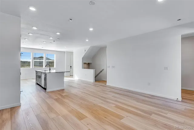 a view of kitchen with wooden floor