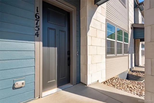 a view of a door and a window