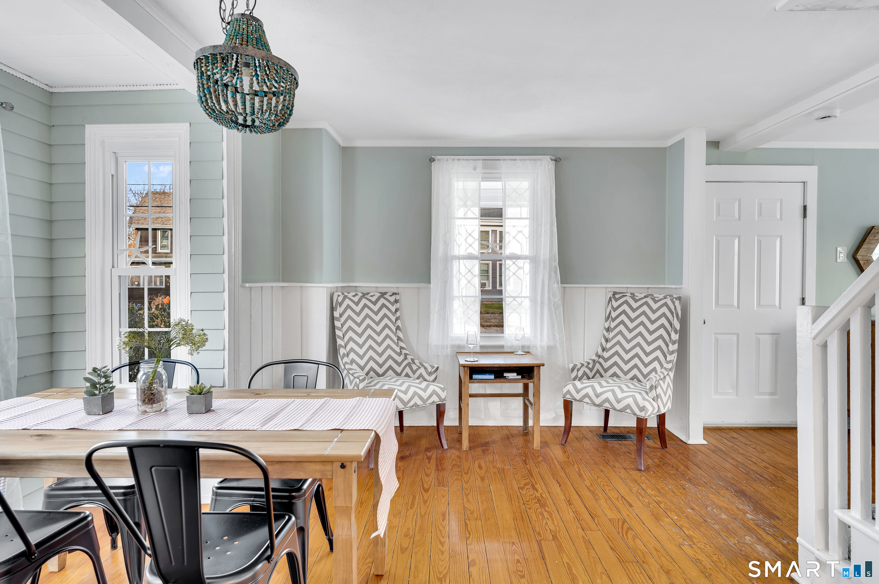 109 Salt Island Road Westbrook, CT 06498 - Photo 12 of 29 a dining room with furniture and wooden floor