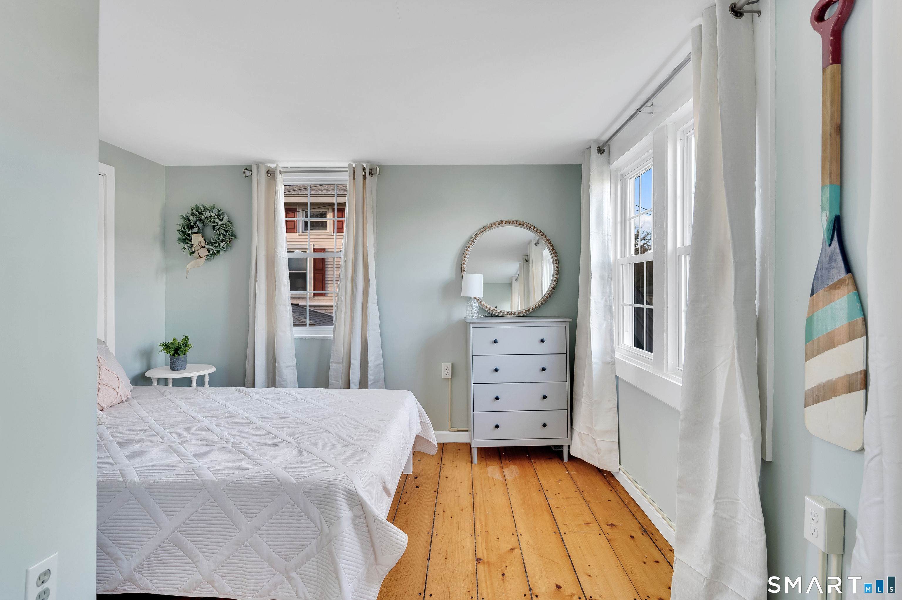 109 Salt Island Road Westbrook, CT 06498 - Photo 15 of 29 a room with dresser and mirror