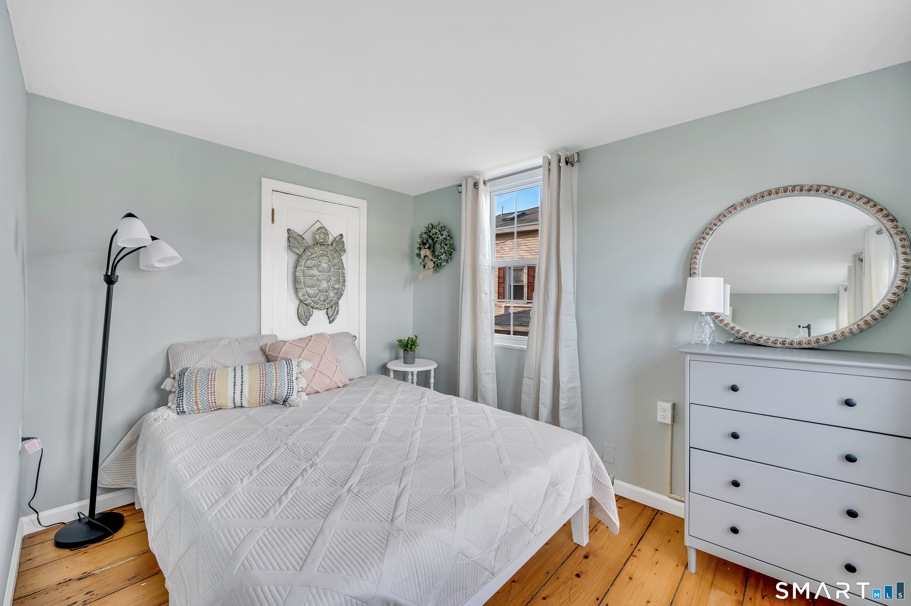 109 Salt Island Road Westbrook, CT 06498 - Photo 16 of 29 a bedroom with a bed and a dresser