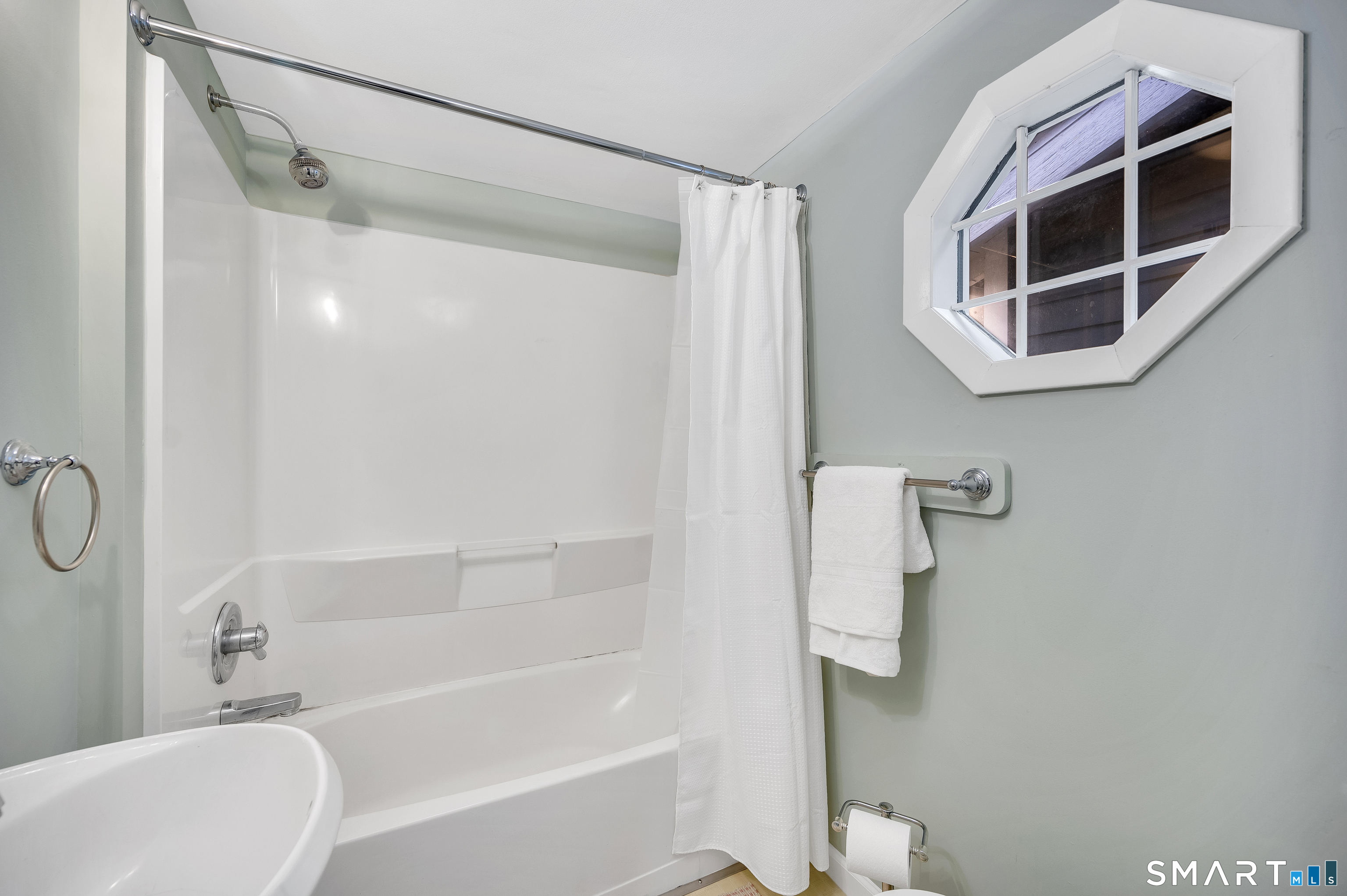 109 Salt Island Road Westbrook, CT 06498 - Photo 17 of 29 a bathroom with a shower and a mirror