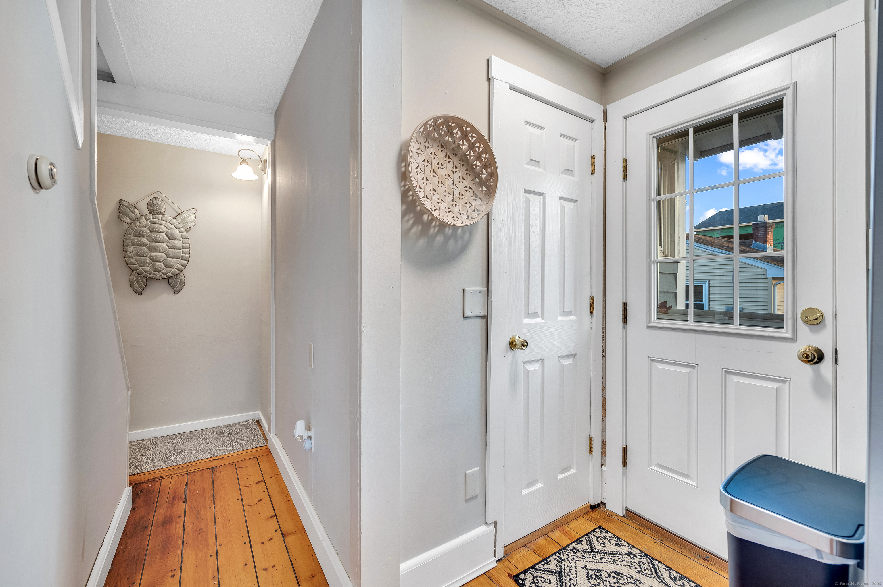 109 Salt Island Road Westbrook, CT 06498 - Photo 28 of 29 a view of front door with wooden floor