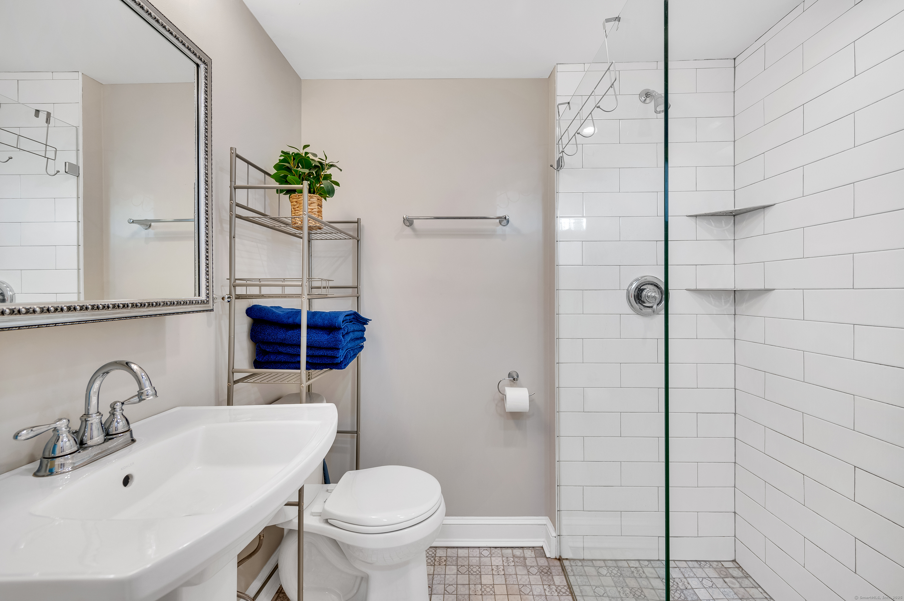 109 Salt Island Road Westbrook, CT 06498 - Photo 29 of 29 a bathroom with a sink toilet and shower