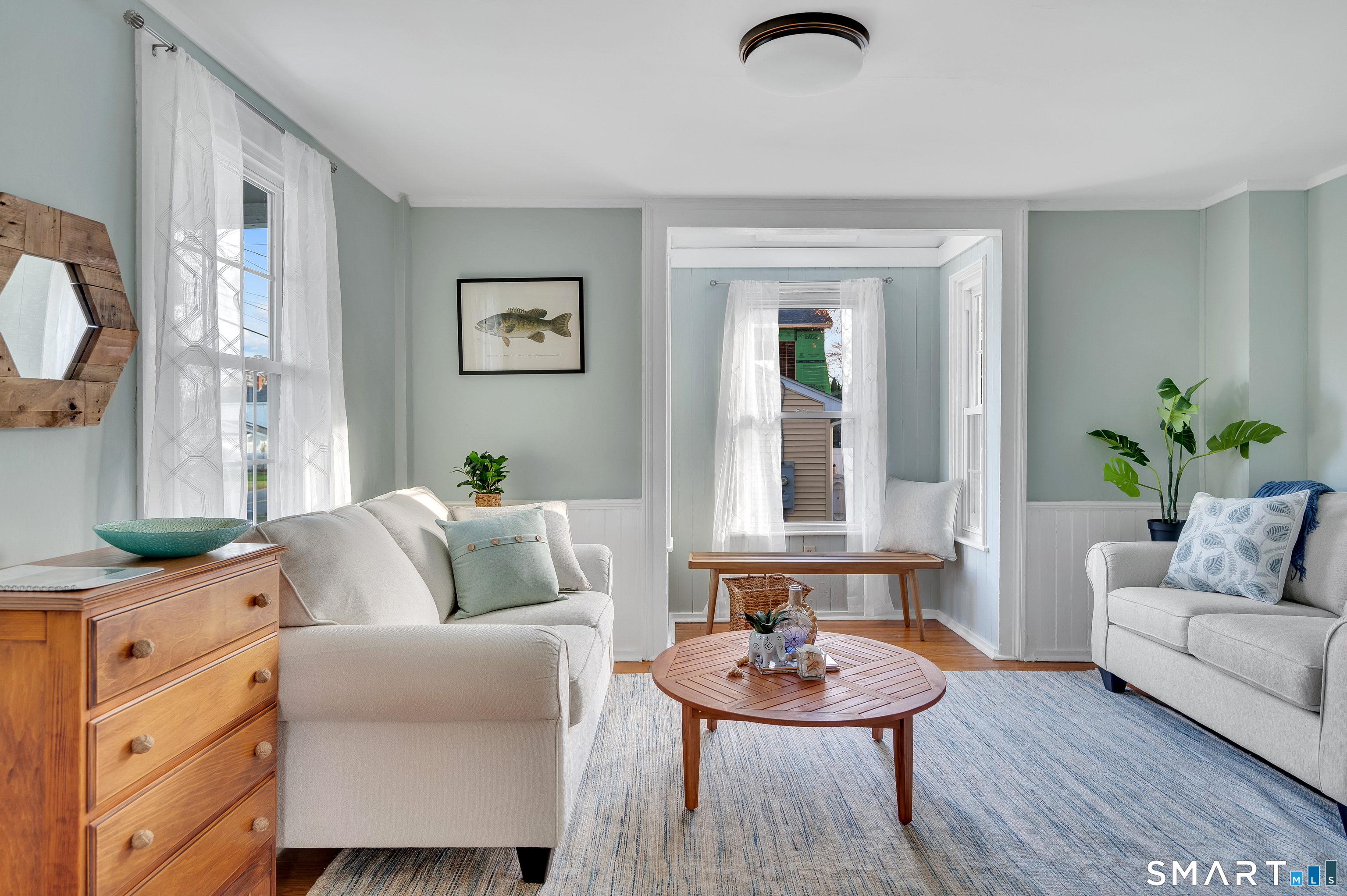 109 Salt Island Road Westbrook, CT 06498 - Photo 7 of 29 a living room with furniture and wooden floor