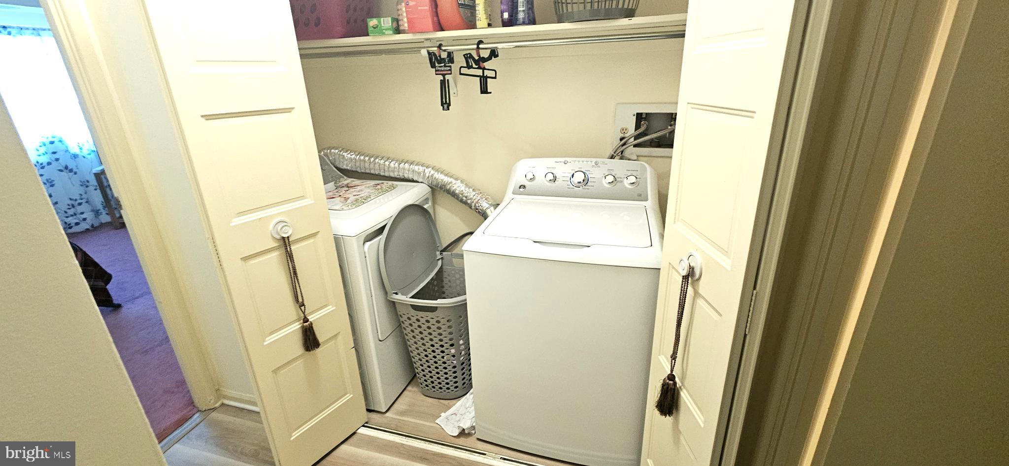 1101 Delaire Landing Road, Unit 101 Philadelphia, PA 19114 - Photo 12 of 29 Efficient laundry space with dual appliances.