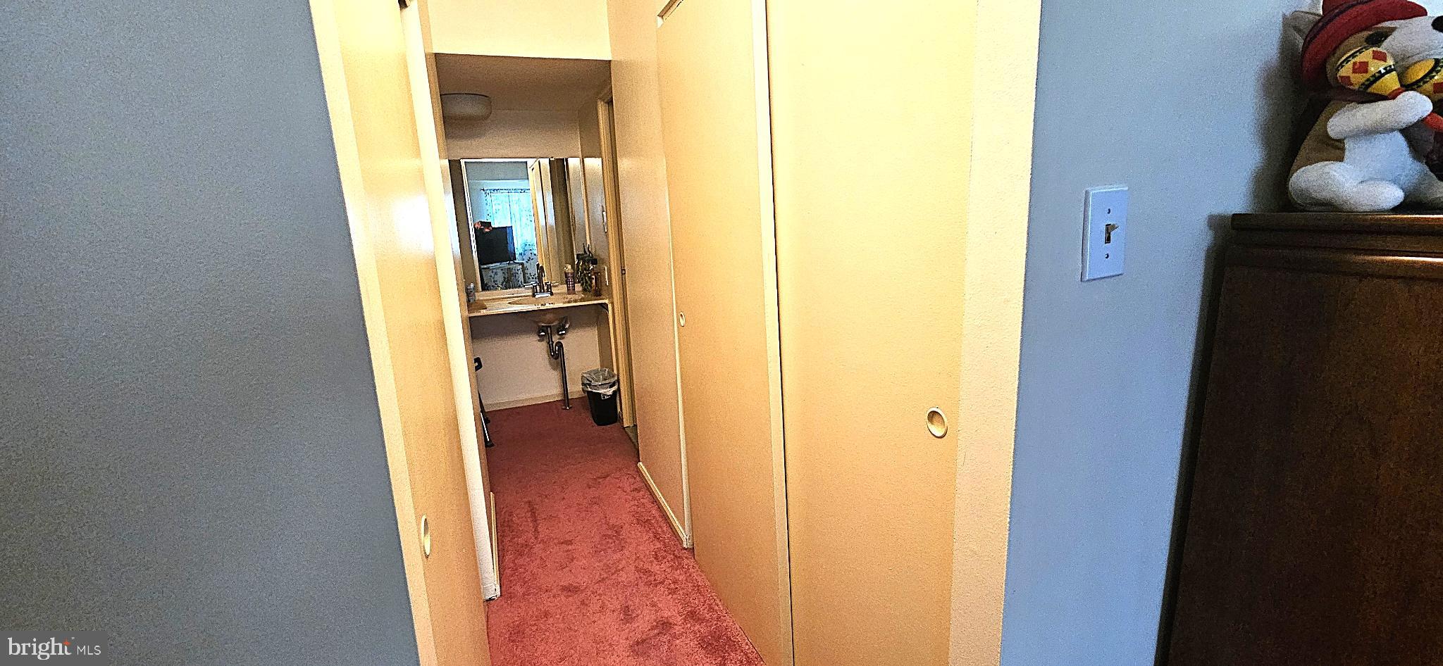 1101 Delaire Landing Road, Unit 101 Philadelphia, PA 19114 - Photo 15 of 29 Inviting hallway with warm tones and charm.