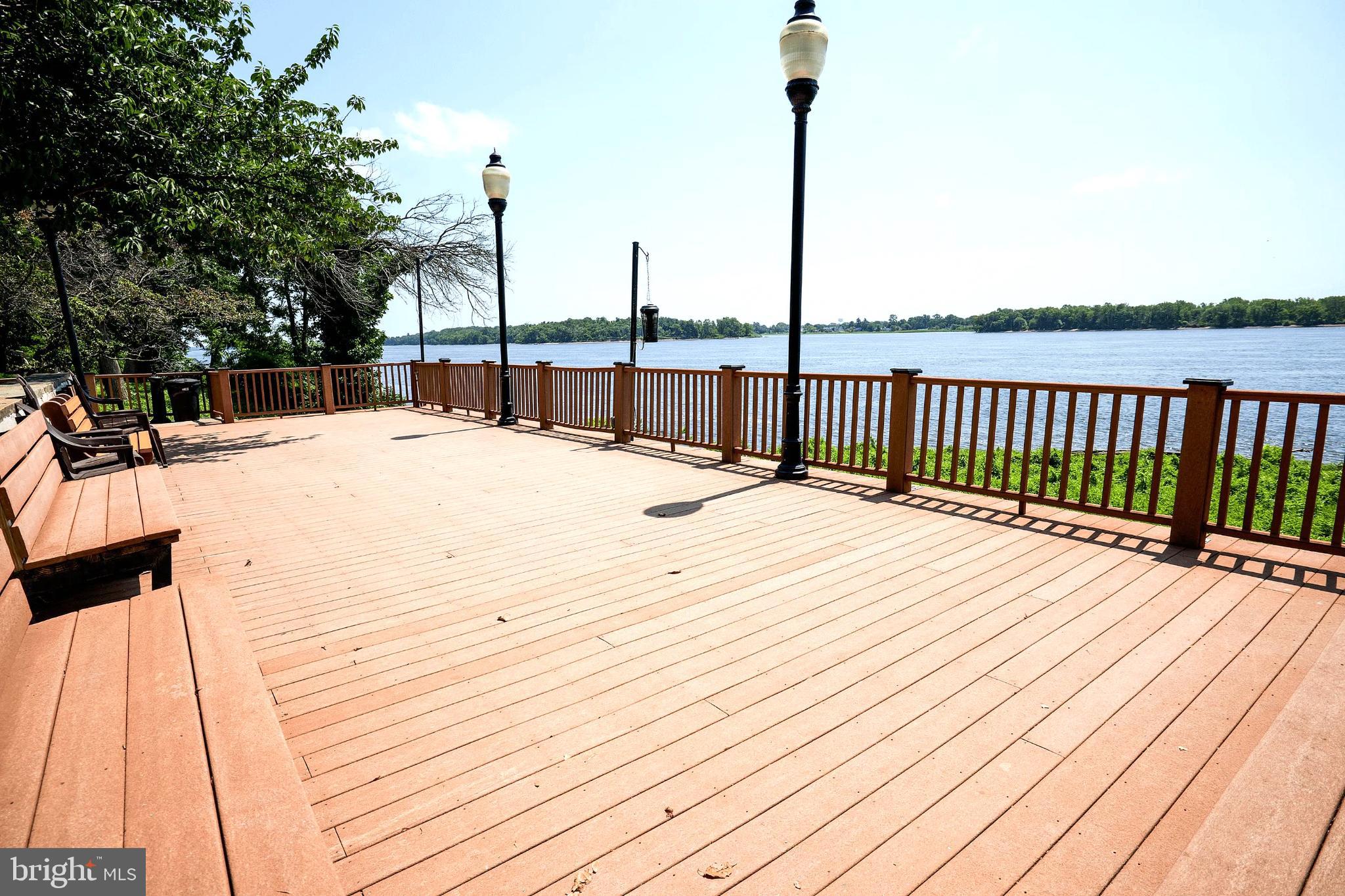 1101 Delaire Landing Road, Unit 101 Philadelphia, PA 19114 - Photo 22 of 29 Scenic riverside deck inviting relaxation.