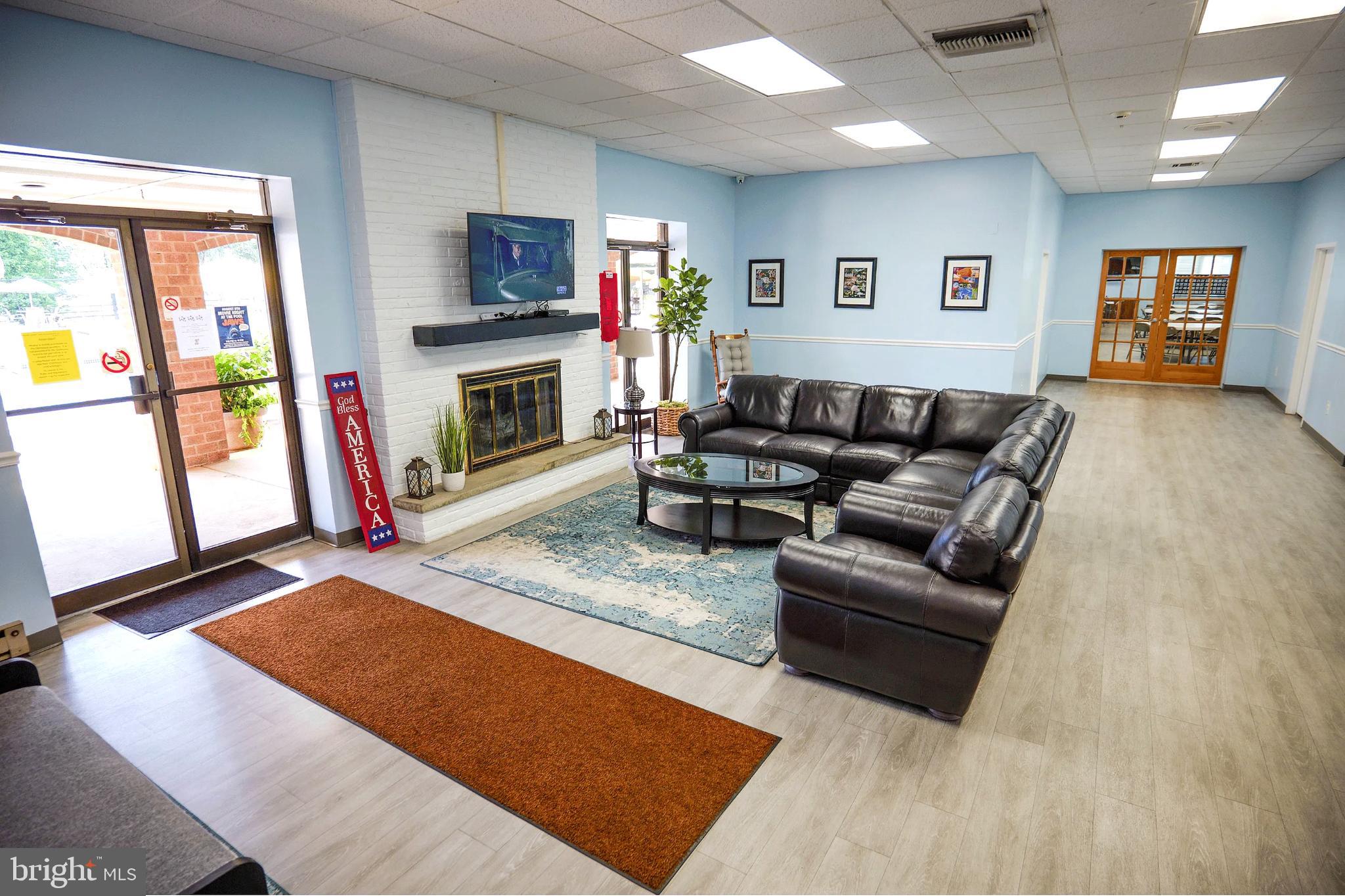 1101 Delaire Landing Road, Unit 101 Philadelphia, PA 19114 - Photo 23 of 29 Inviting communal space with modern decor.