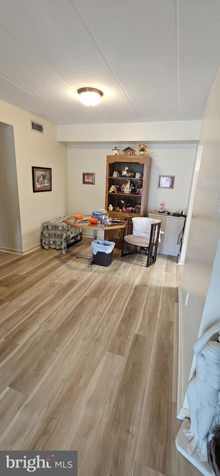 1101 Delaire Landing Road, Unit 101 Philadelphia, PA 19114 - Photo 4 of 29 Inviting space with warm wooden tones.