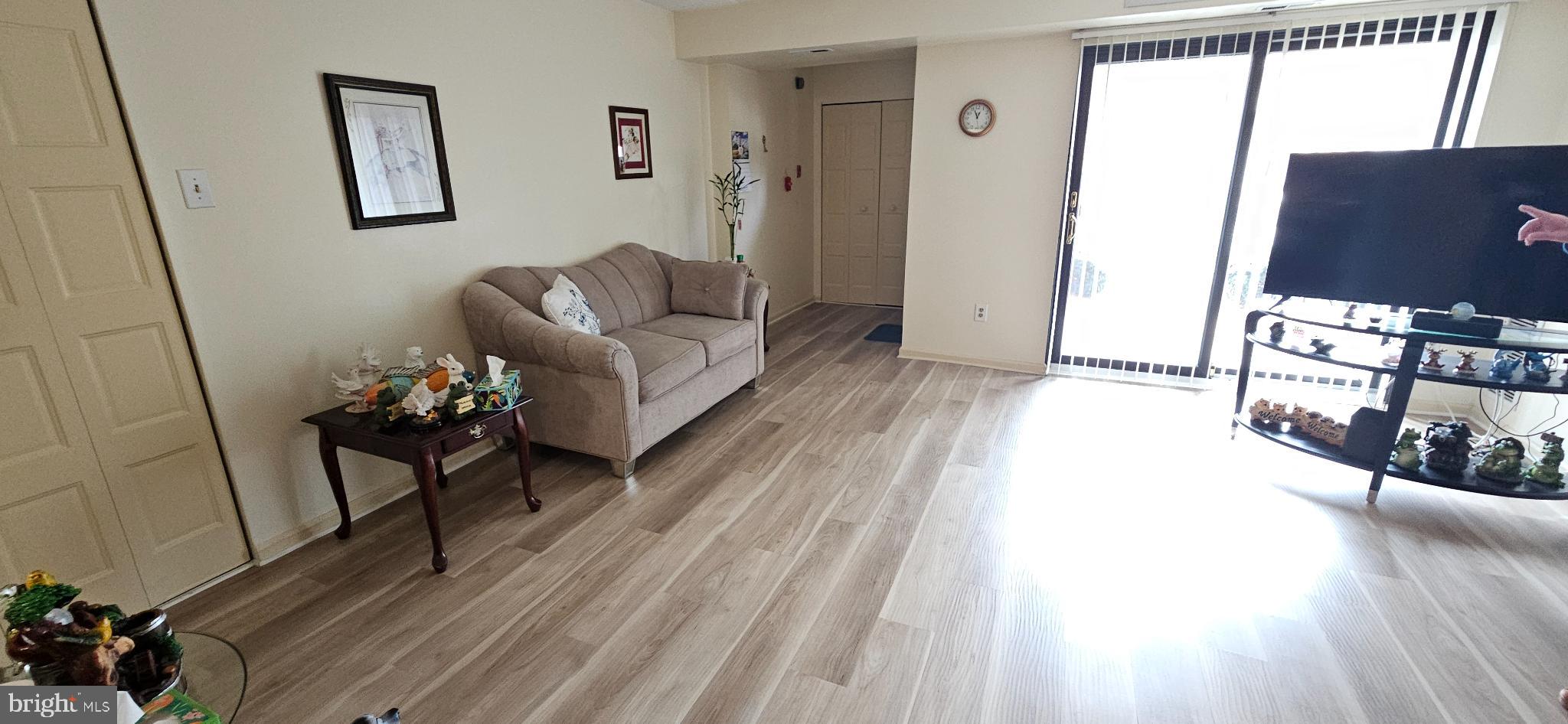 1101 Delaire Landing Road, Unit 101 Philadelphia, PA 19114 - Photo 5 of 29 Bright and airy living space with modern charm.