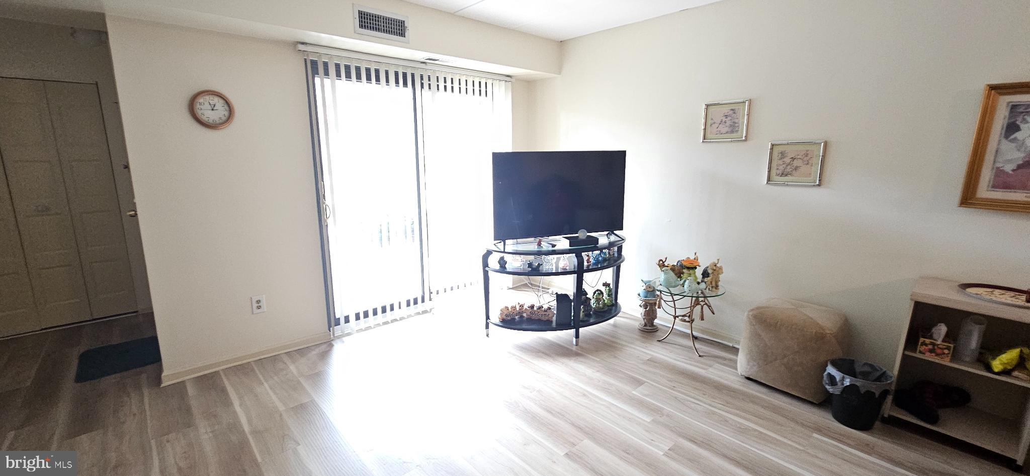 1101 Delaire Landing Road, Unit 101 Philadelphia, PA 19114 - Photo 6 of 29 Bright and airy living space with natural light.