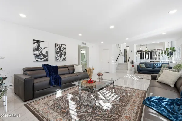 a living room with furniture and a couch