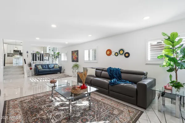 a living room with furniture and a couch
