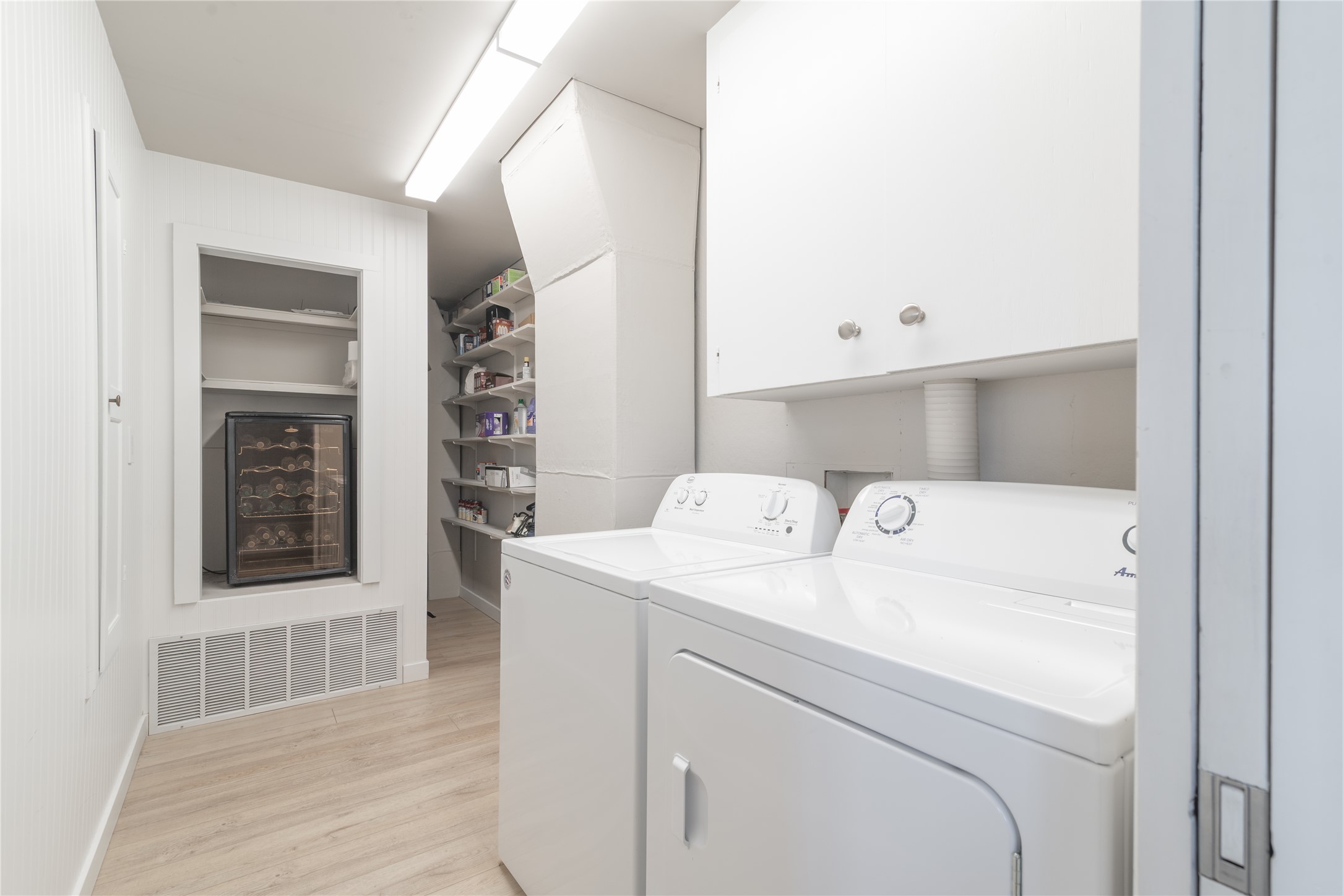 3807 Boat Dock Road Lago Vista, TX 78645 - Photo 13 of 37 A dedicated utility space offers practical laundry solutions and additional storage.