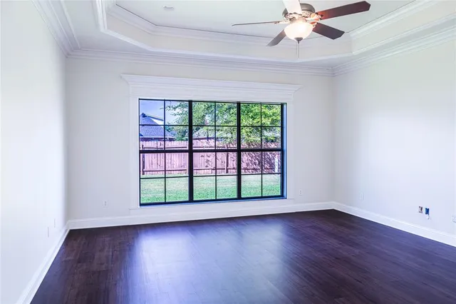 a bathroom with a granite countertop double vanity sink mirror and shower