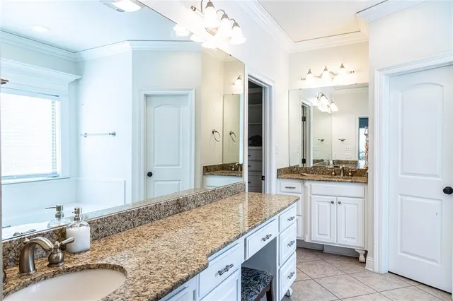 a bathroom with a bathtub and a window