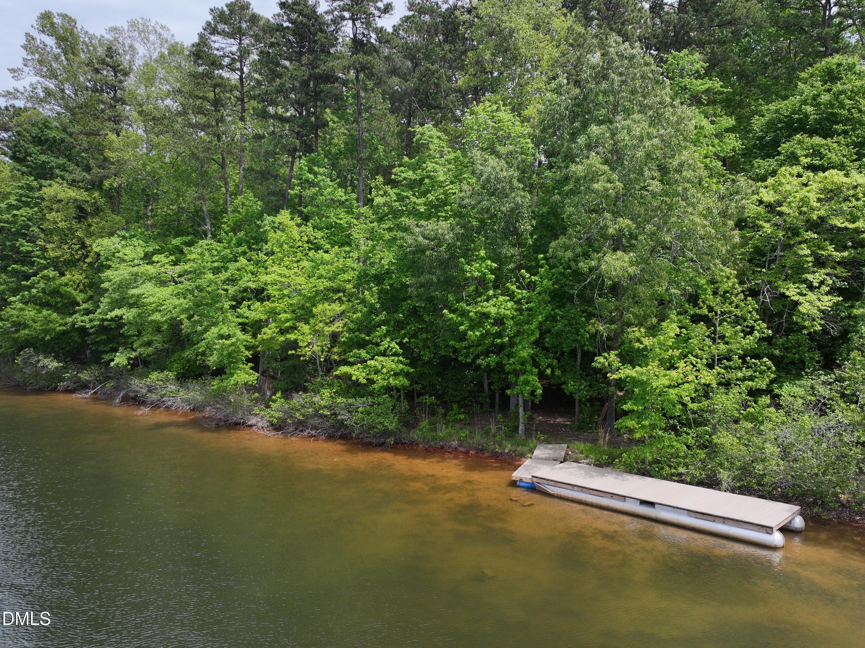 75 Max Finn Lane Roxboro, NC 27574 - Photo 14 of 17 a view of a lake with a mountain