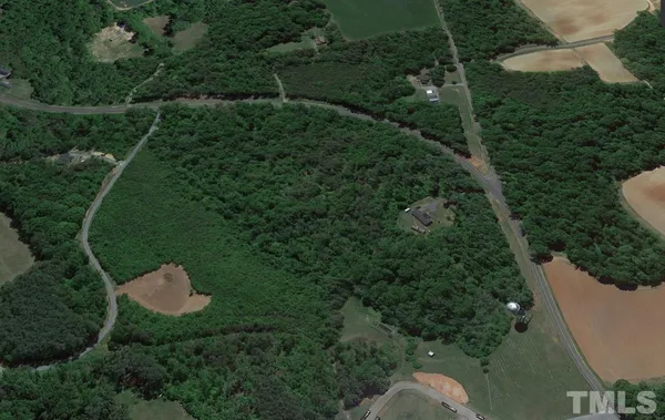 an aerial view of a house with pool yard swimming pool and outdoor seating