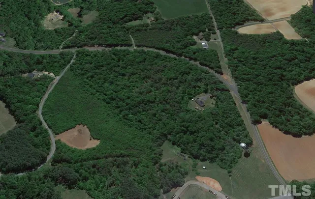 an aerial view of a house with pool yard swimming pool and outdoor seating