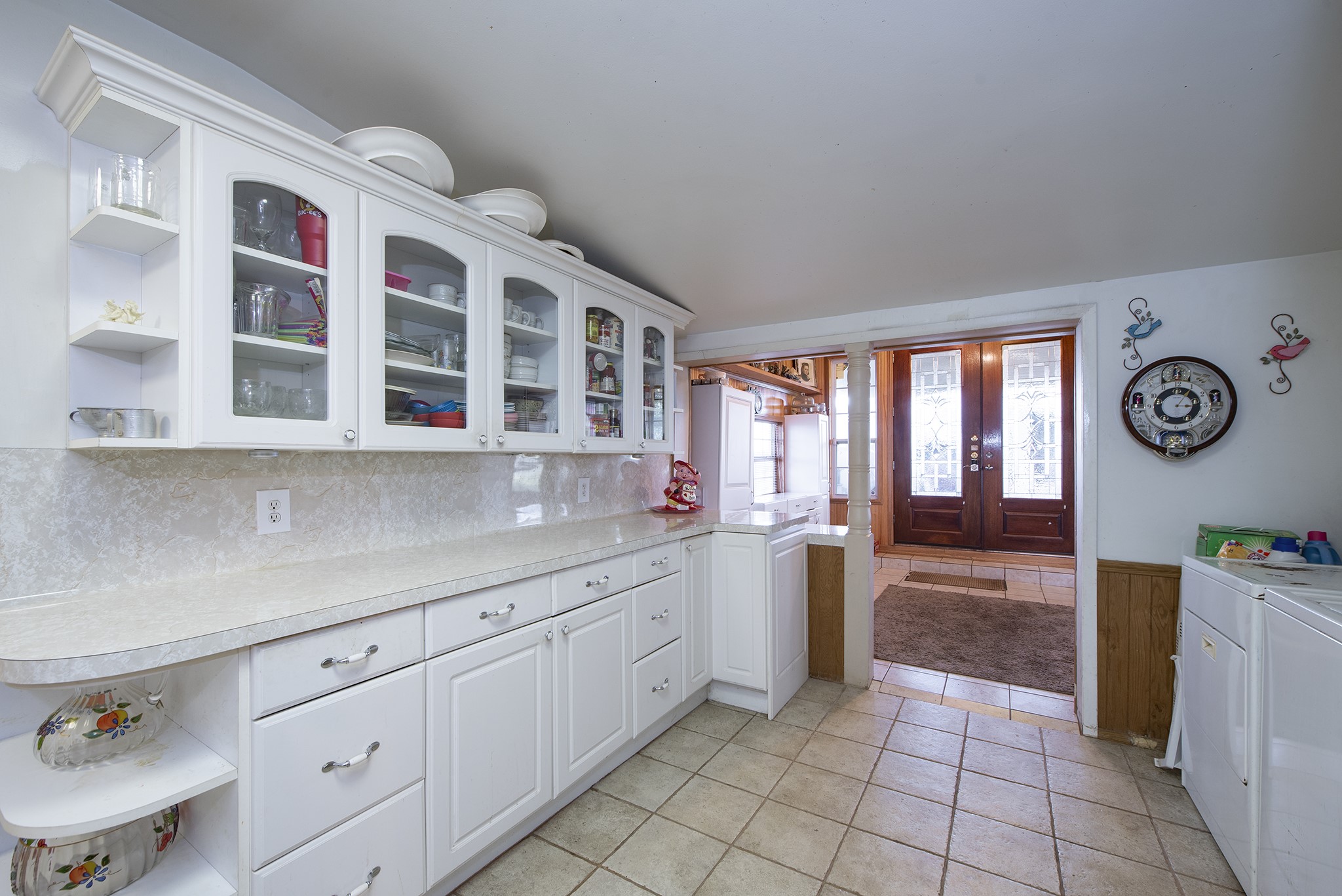 22234 Castle Road Waller, TX 77484 - Photo 36 of 50 a kitchen with cabinets and window